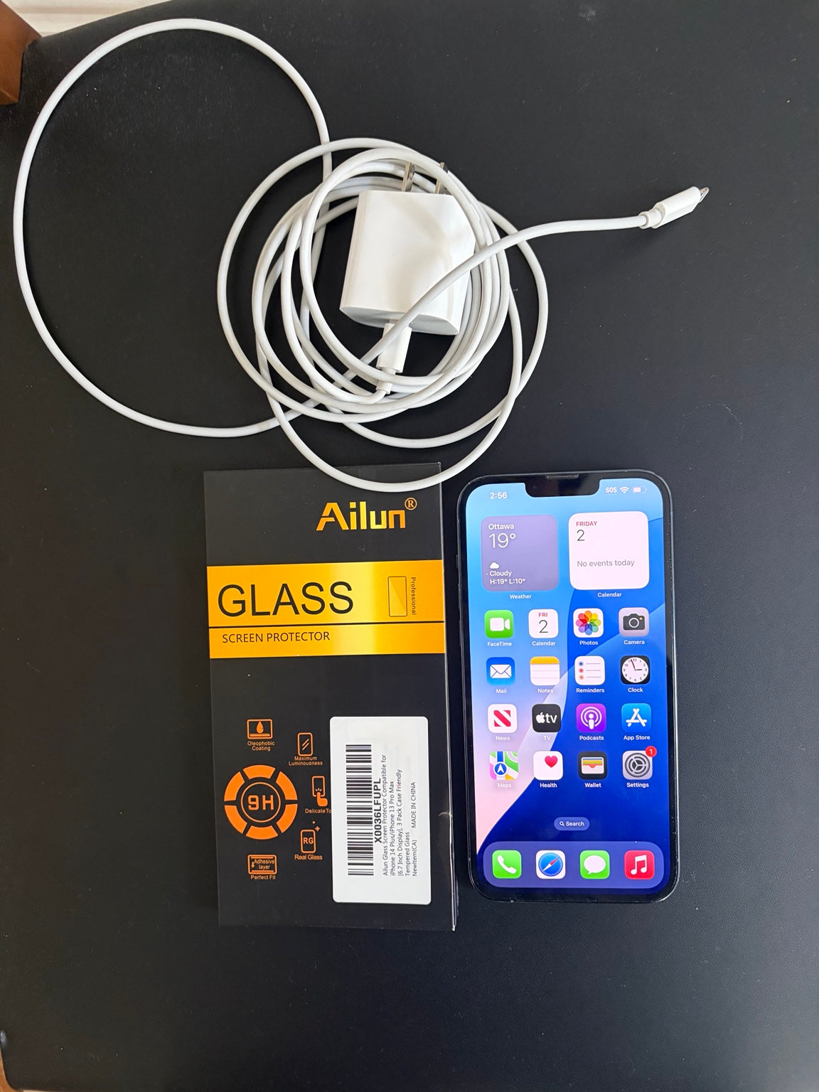 iPhone 13 Pro Max 128GB Sierra Blue front display with charger and screen protector